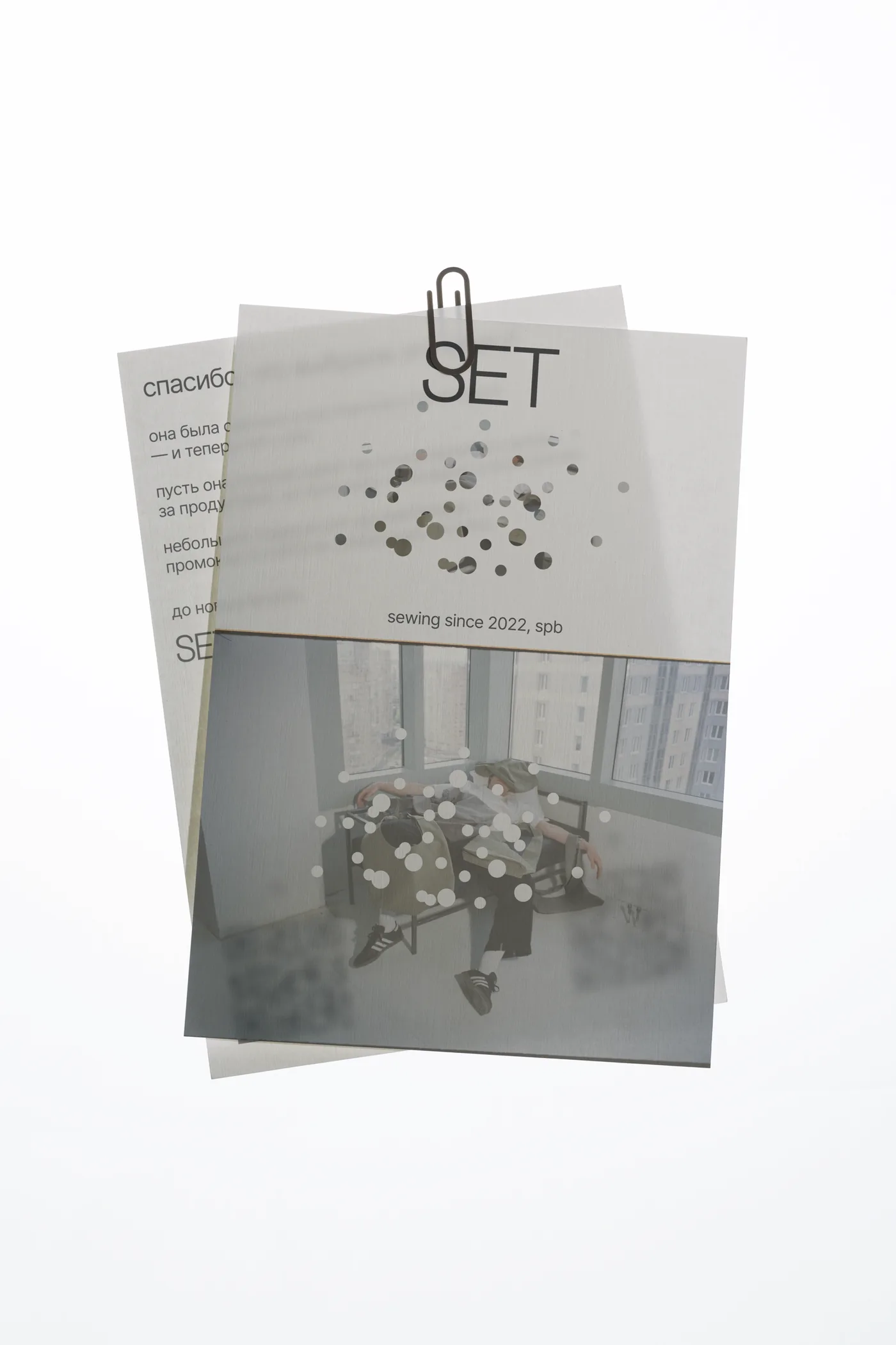 SET brand postcards with logo and dot pattern